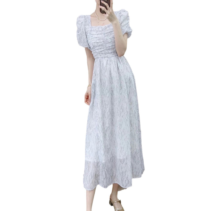 Dame maxikjole med elegant flæsedesign og delikat stof Stilla