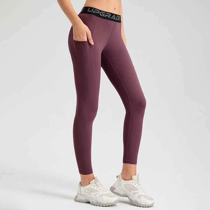 Dame Sporty High-Waist Leggings med praktiske sidelommer og fleksibel pasform Stilla