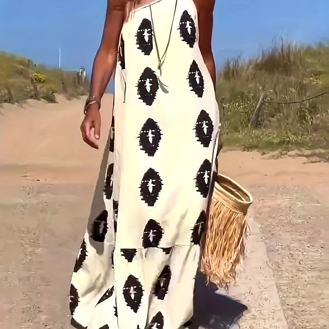 Dame Maxikjole med asymmetrisk strop og folkloristisk mønster Stilla