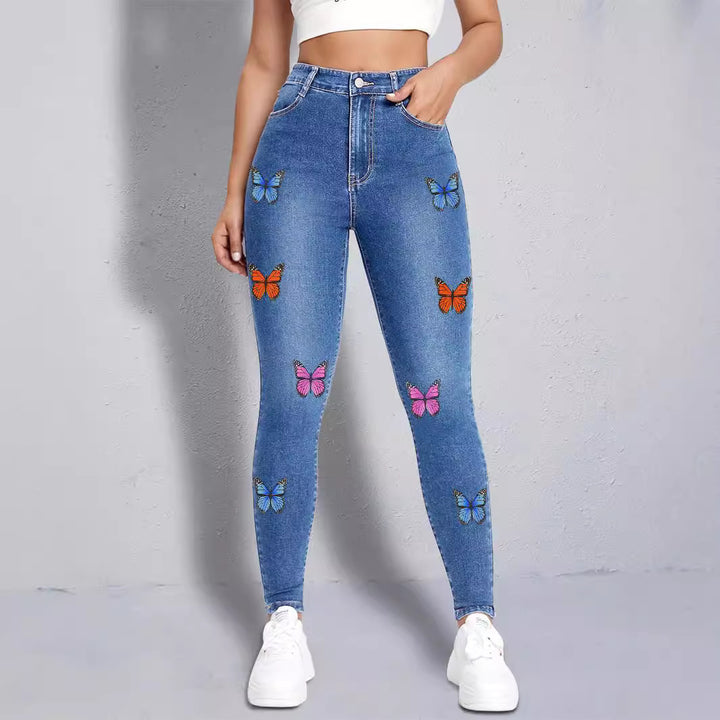 Dame Skinny Jeans med farverige sommerfugleapplikationer Stilla