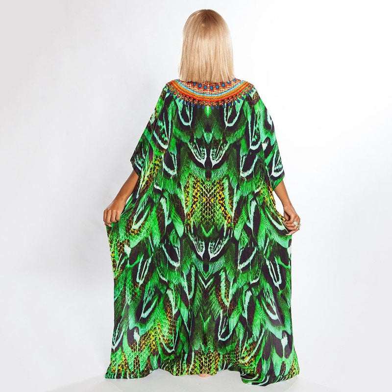 Dame Kaftan i elegant skridt-design med kunstnerisk Afrika-motiv Stilla