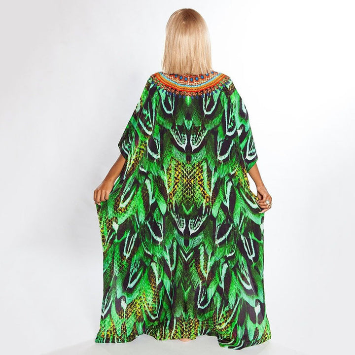Dame Kaftan i elegant skridt-design med kunstnerisk Afrika-motiv Stilla