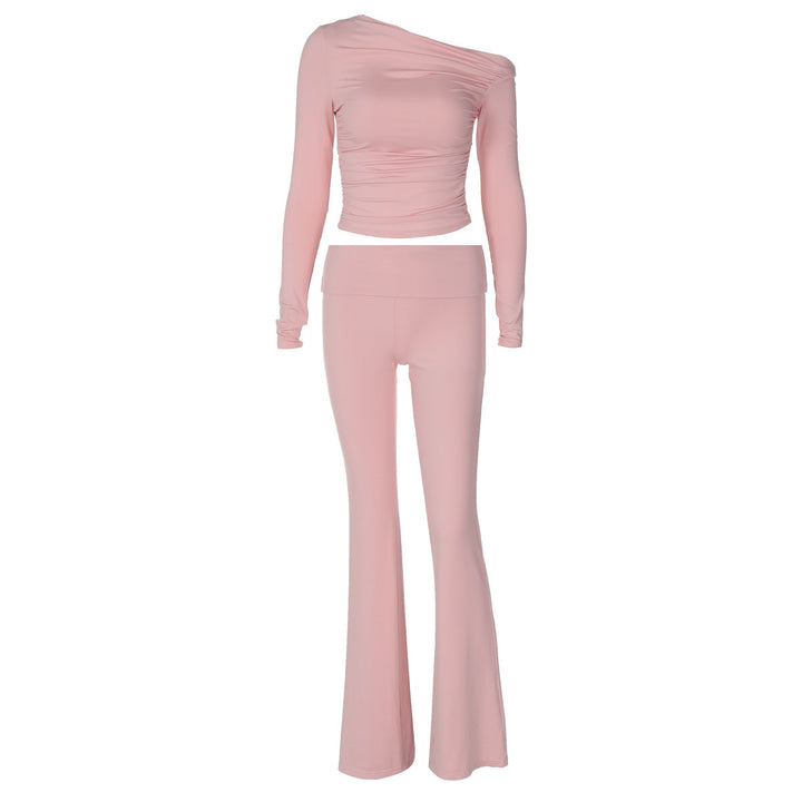 Dame Elegant og figursyet sportkombination med asymmetrisk top og flared bukser Stilla