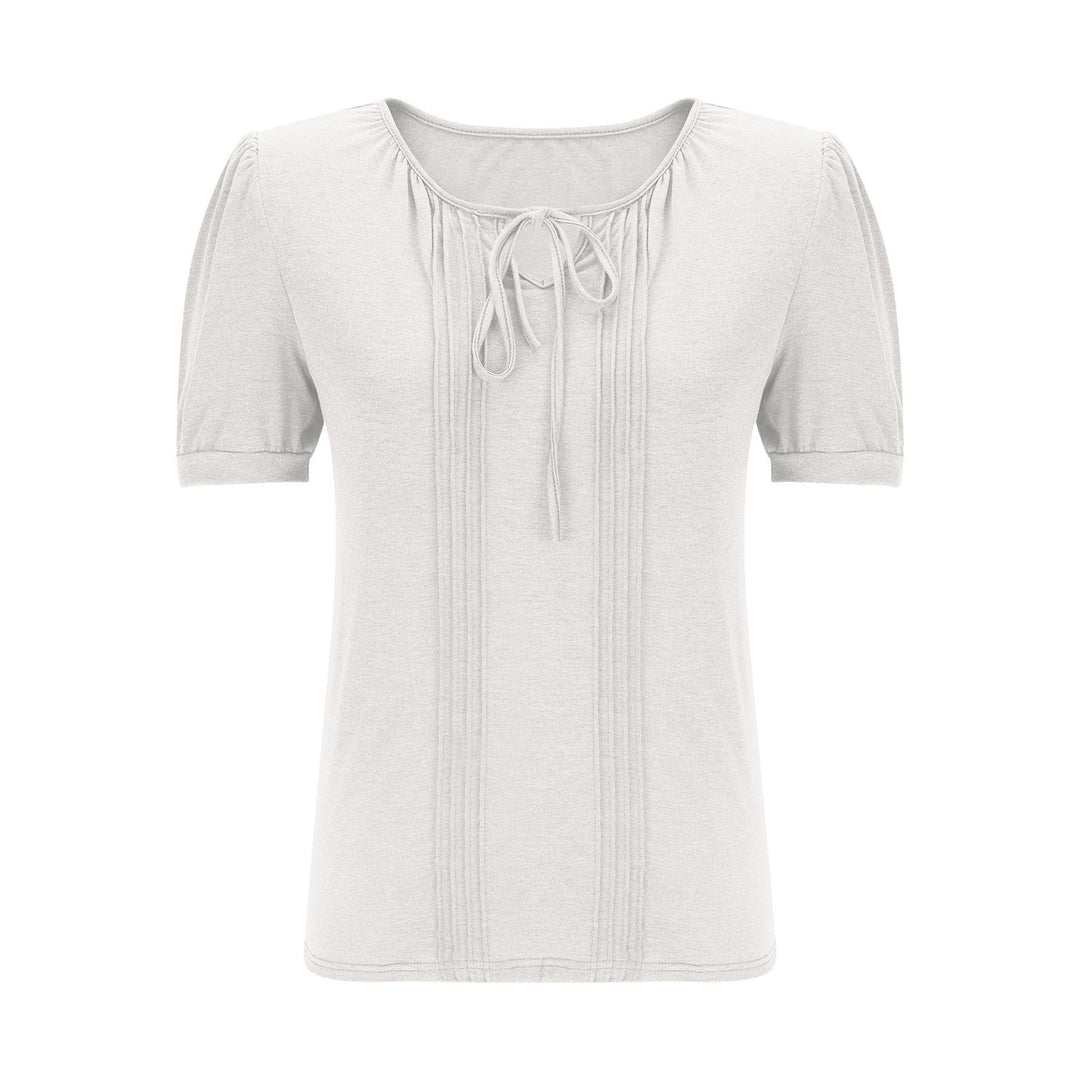 Damebluse med puffærmer og raffineret halterneck Stilla