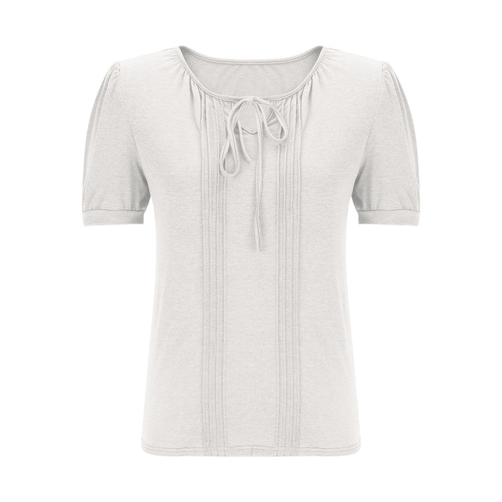 Damebluse med puffærmer og raffineret halterneck Stilla