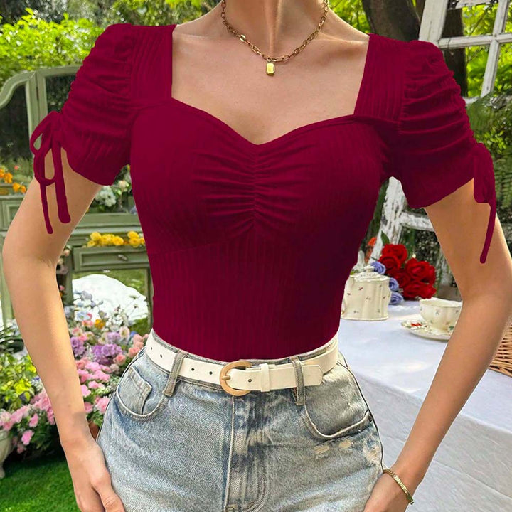 Dame bluse top med flæse detaljer og elegant ryg Stilla