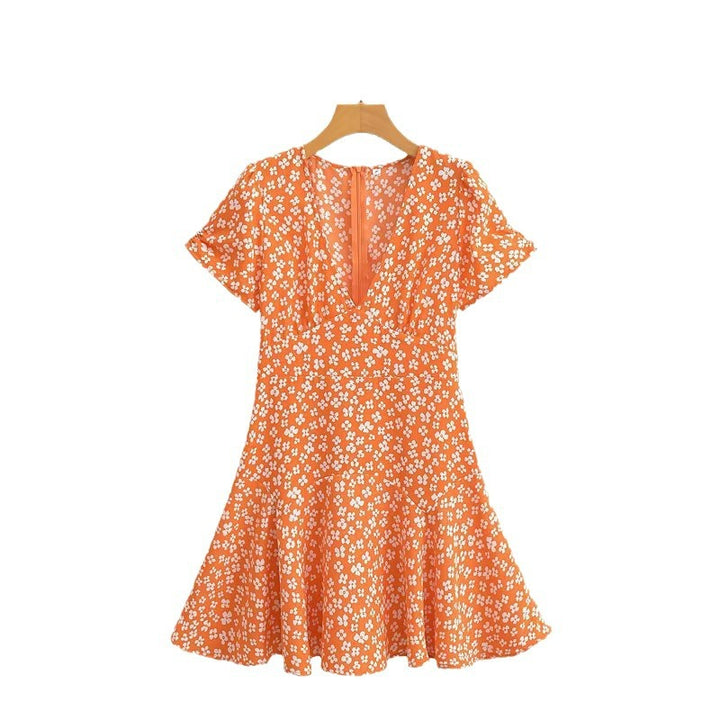 Dame sommerkjole med blomsterprint i elegant snit Stilla