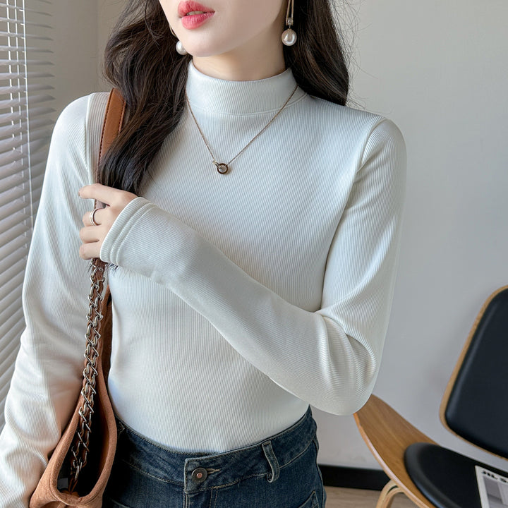 Kvinders langærmet cropped top med høj krave og ribbet tekstur Stilla
