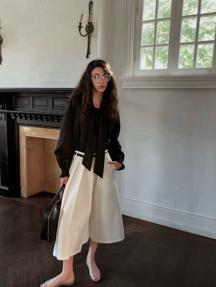 Dame Oversized Bluse med gennemgående indpakningsdesign og elegante detaljer Stilla