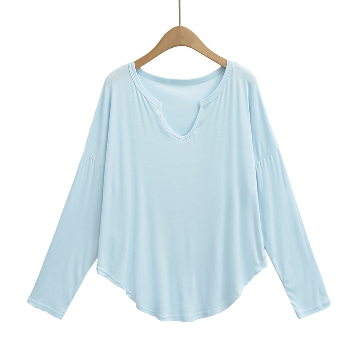 Dame afslappet longsleeve top med dyb v-hals og løstsiddende snit Stilla