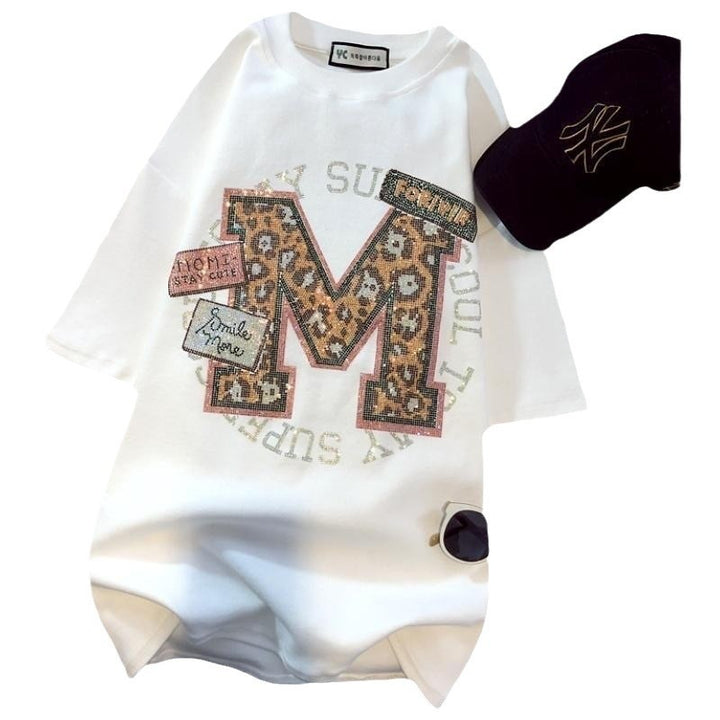 Dame Oversized T-shirt med kreativ applikationsdesign og urban stil Stilla