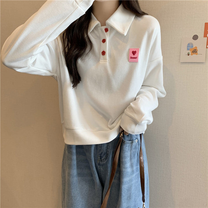 Femme Relaxed Fit Polo-Style Sweatshirt med Hjerteemblem Stilla