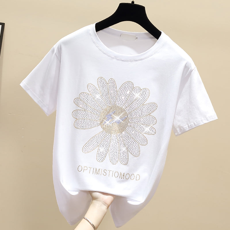 Dame T-shirt med kreativ glimmer-blomstermotiv og inspirerende tekst Stilla
