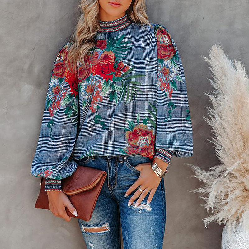 Damer modebluse med puffærmer og blomstret design Stilla