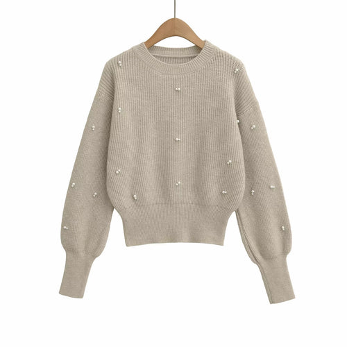 Dame modisk strikpullover med elegante perledetaljer Stilla
