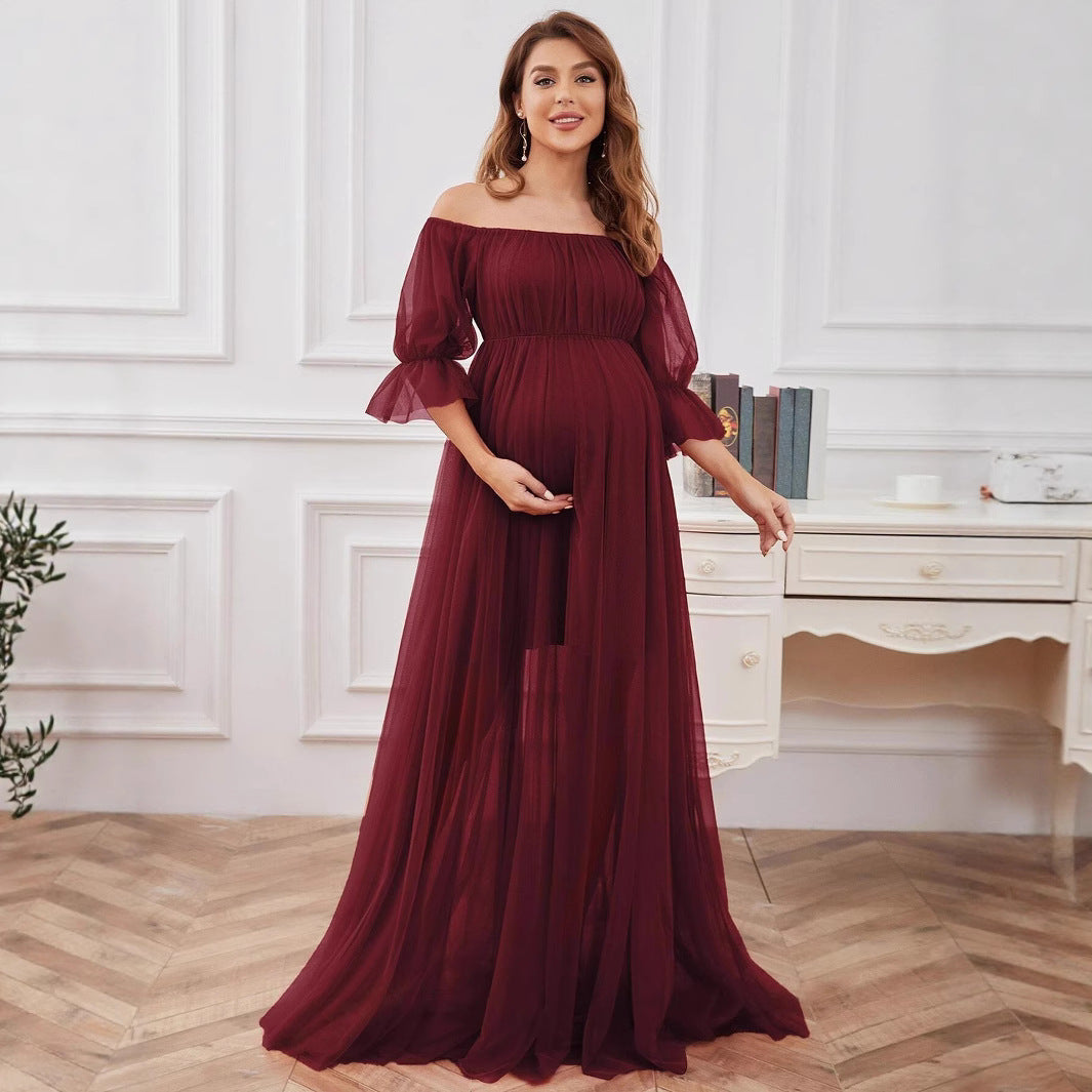 Dame Elegant gravidkjole med off-shoulder design og luftig tyl Stilla