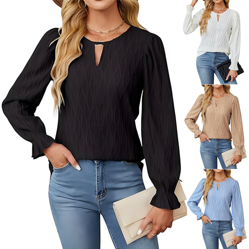 Dame indpakningsbluse med raffineret strukturdesign og elegante puffærmer Stilla