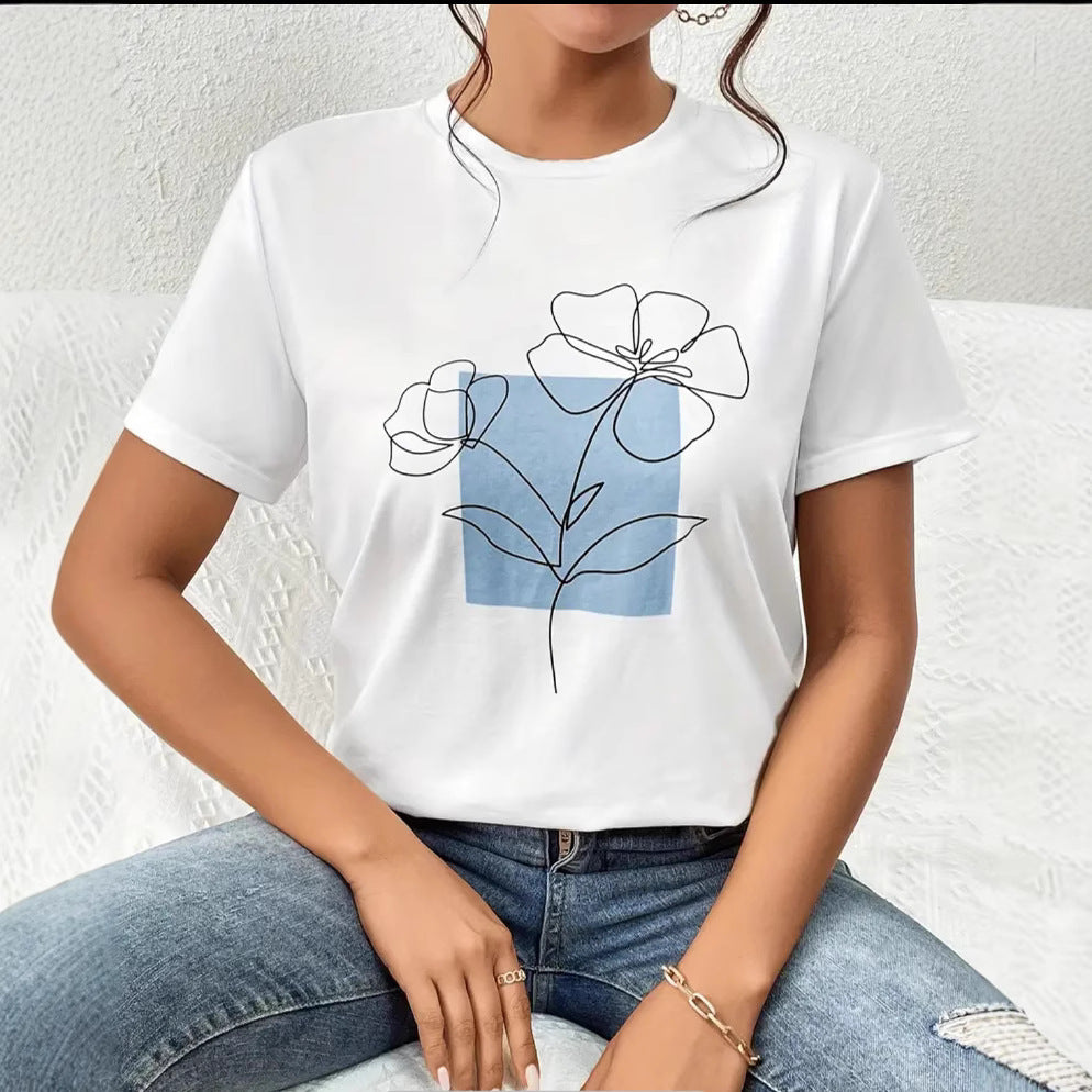 Dame T-shirt med kunstnerisk blomsterdesign og moderne grafikdesign Stilla