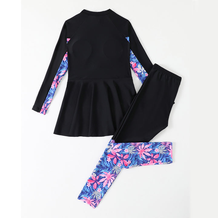 Dame todelt surfingdragt med moderne zip-design og tropisk print Stilla