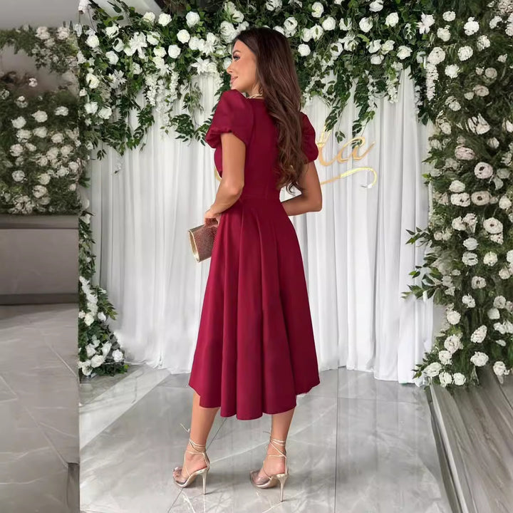 Dame elegant Midikjole med hurtiglook og puffærmer Stilla