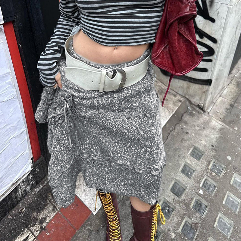 Dame asymmetrisk strikjakke med fashionable ribdetaljer og binde detaljer Skovae