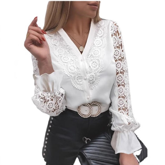 Dame spids bluse med florale ornamenter og lange ærmer Stilla