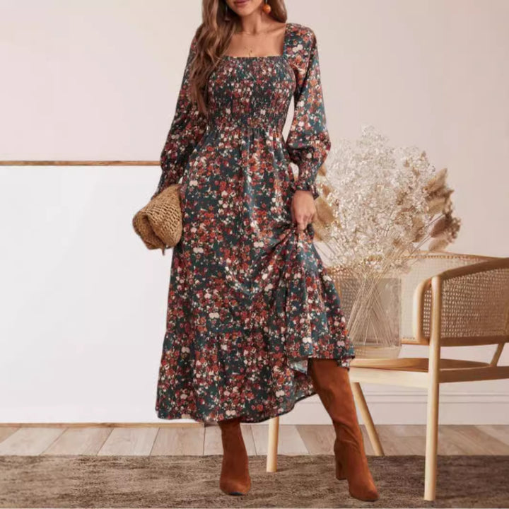 Dame maxikjole med flæsekant og tidløst blomsterdesign Stilla
