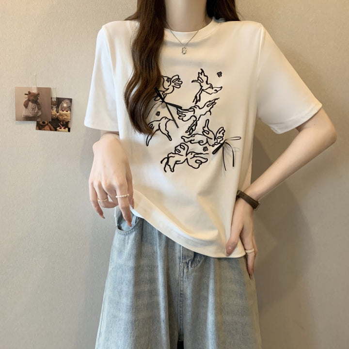 Femme Kunstnerisk Grafik T-shirt med Legesyg Design Stilla