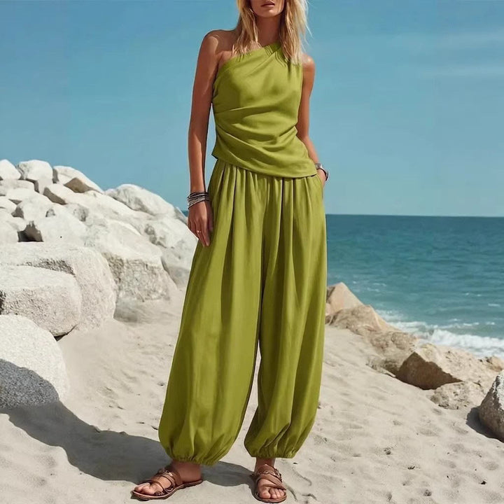 Damer Elegante Én-delt Outfit med Flydende Snit og One-Shoulder Design Skovae