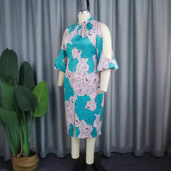 Dame elegant wrap dress with floral pattern and trendy cut-out sleeves Skovae