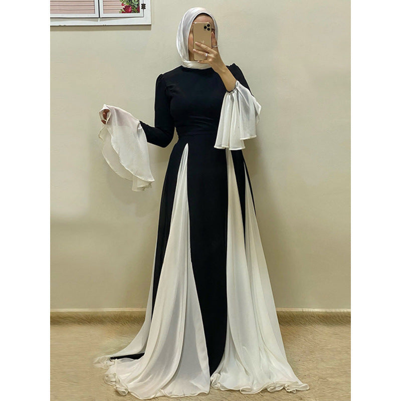 Dame elegant maxikjole med asymmetrisk skørt og voluminøse ærmer Stilla