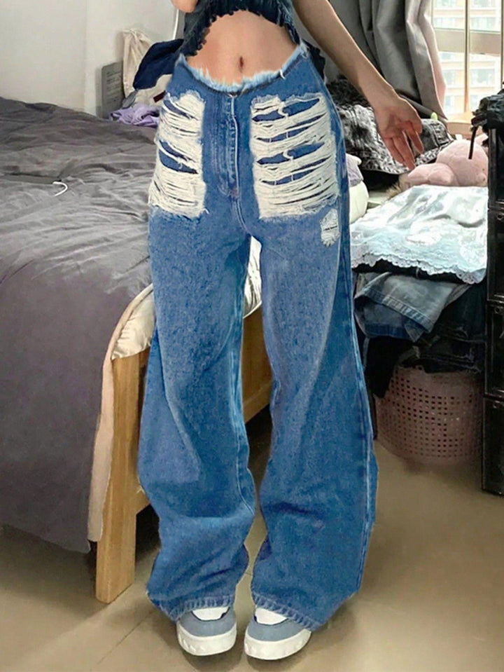 Dame brede jeans med iøjnefaldende rivdetaljer og afslappet snit Stilla