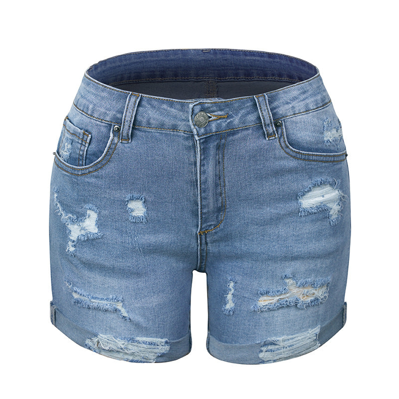 Dame mode denim-shorts med stilige riv detaljer og opfoldet kant Stilla