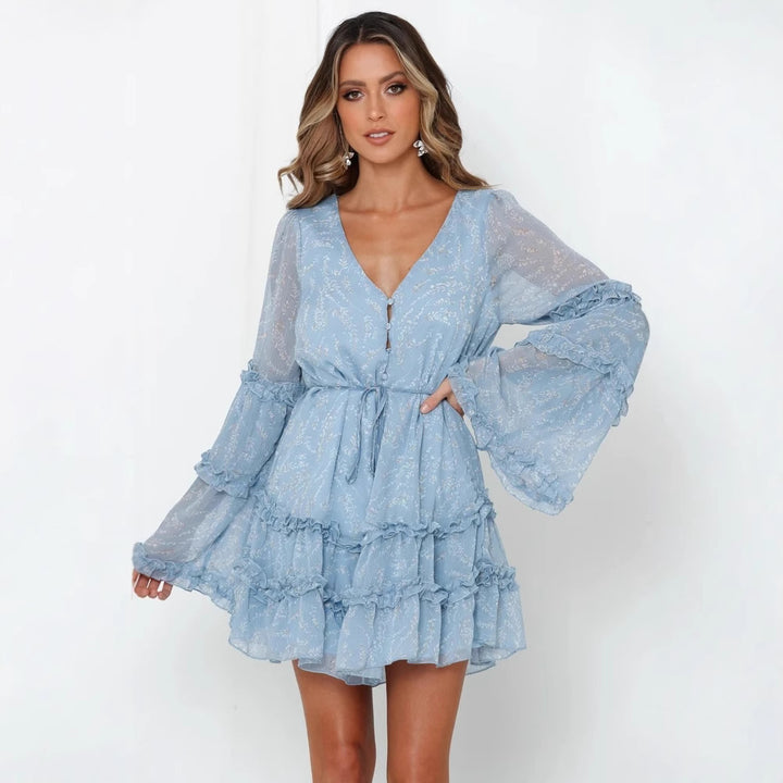 Women's ruffled dress with long, transparent sleeve and tie belt Skovae