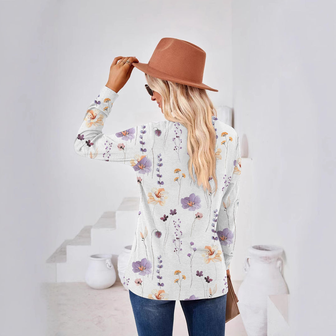 Damebluse med blomster mønster og knap detaljer Stilla