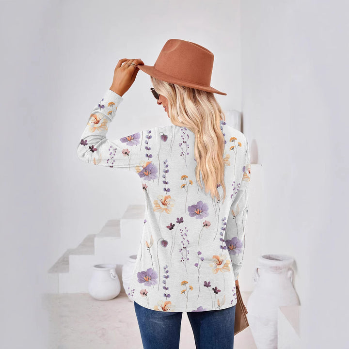 Damebluse med blomster mønster og knap detaljer Stilla