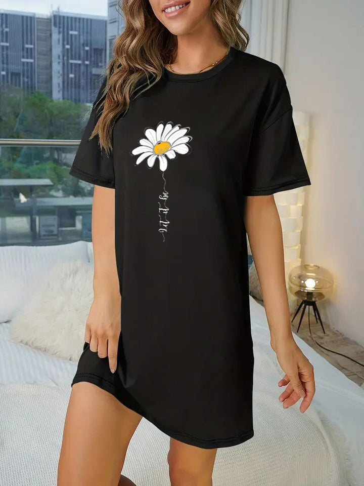 Dame T-shirt kjole med kunstnerisk blomsterdesign og tætsiddende snit Skovae