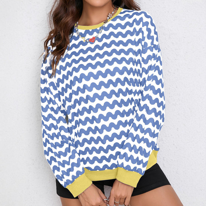 Kvindernes farverige sweatshirt med bølgedesign og sporty snit Stilla