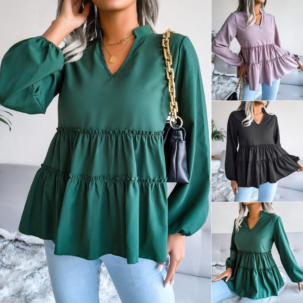 Damebluse med flerfarvet design og voluminøst snit Stilla