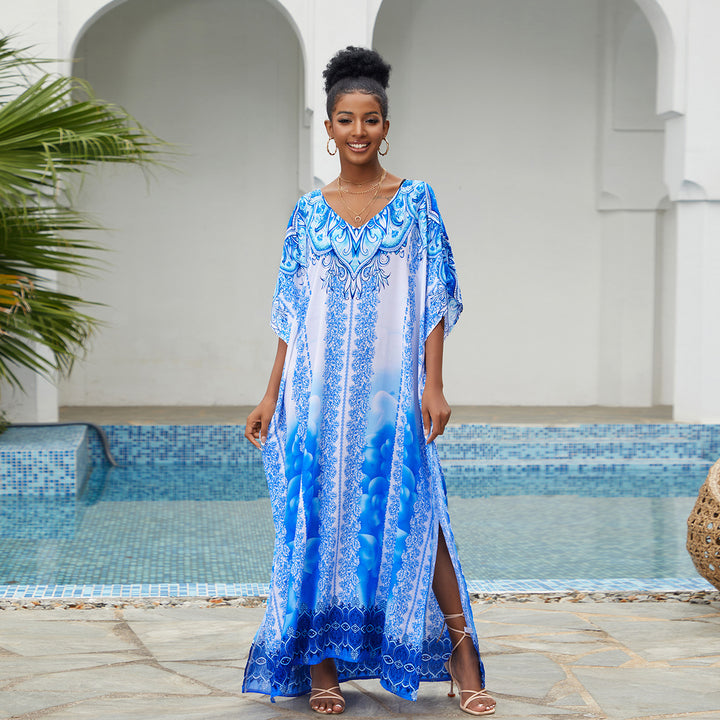 Dame lang kaftan med elegant blomsterdesign og sidelommer Stilla