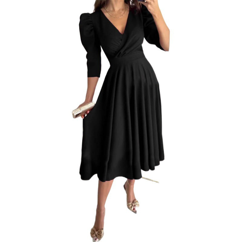 Femme Elegantes Fit-and-Flare Midi Kjole med Pufærmer Stilla