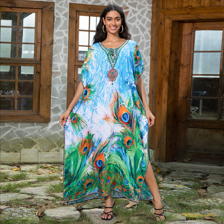 Dame Strandkaftan med kunstnerisk påfuglemotiv og fine detaljer Stilla