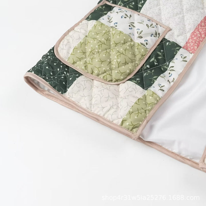 Dame quiltet patchworkjakke med blomstret design og praktiske lommer Stilla