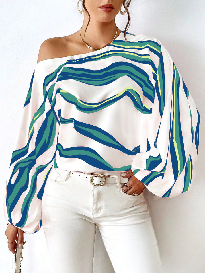 Dame Off-Shoulder-bluse med voluminøse ærmer og moderne stribemønster Stilla