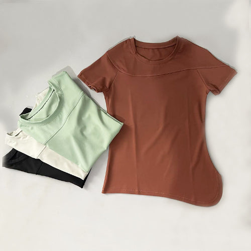 Dame Sports kortærmet T-shirt med innovativ asymmetrisk snit og åndbare egenskaber Stilla