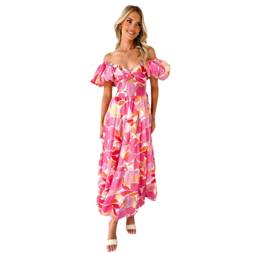 Dame maxikjole med voluminøse puffærmer og blomstret design Stilla