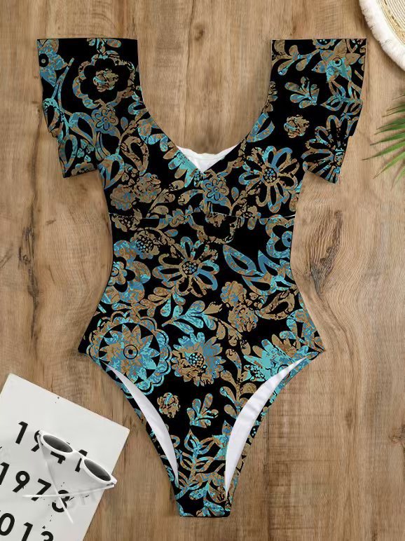 Dame One-piece badedragt med blomster detaljer og dyb V-hals Stilla