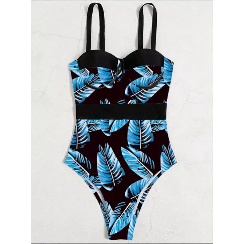 Dame one-piece badedragt med blomstret design og elegant silhuet Skovae
