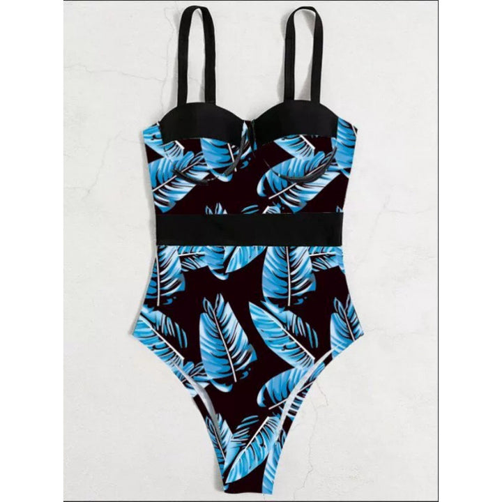 Dame one-piece badedragt med blomstret design og elegant silhuet Skovae
