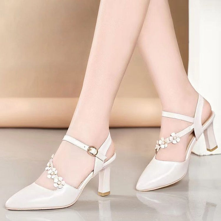 Dame Slingback-pumper med florale accenter og elegant spænde Stilla